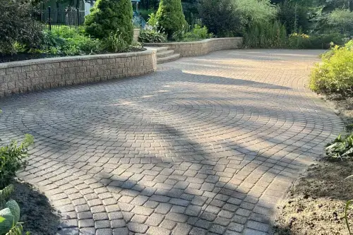 Beautiful Backyard Patio Pavers Sparkle in the Sunlight After Being Restored by GrimeBusters Soft Wash and Holiday Lighting.