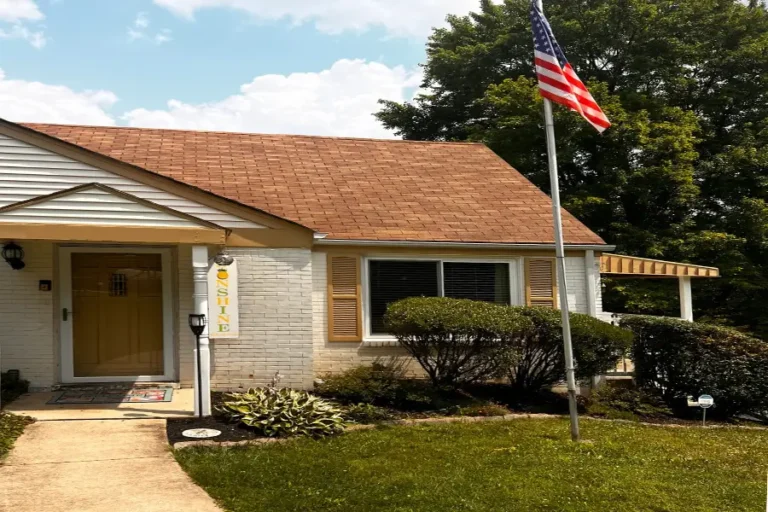 A Single Story, Suburban Home Shines in the Sun After Being Soft Washed.