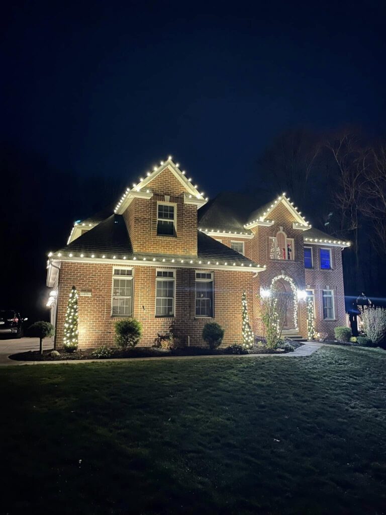 Christmas Lighting Illuminates an Erie Home At Night.