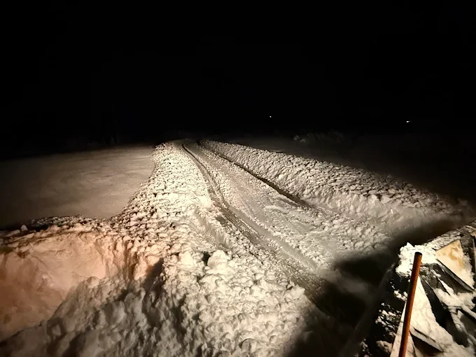 Erie Snow Removal Company Plowing a Snowy Driveway.